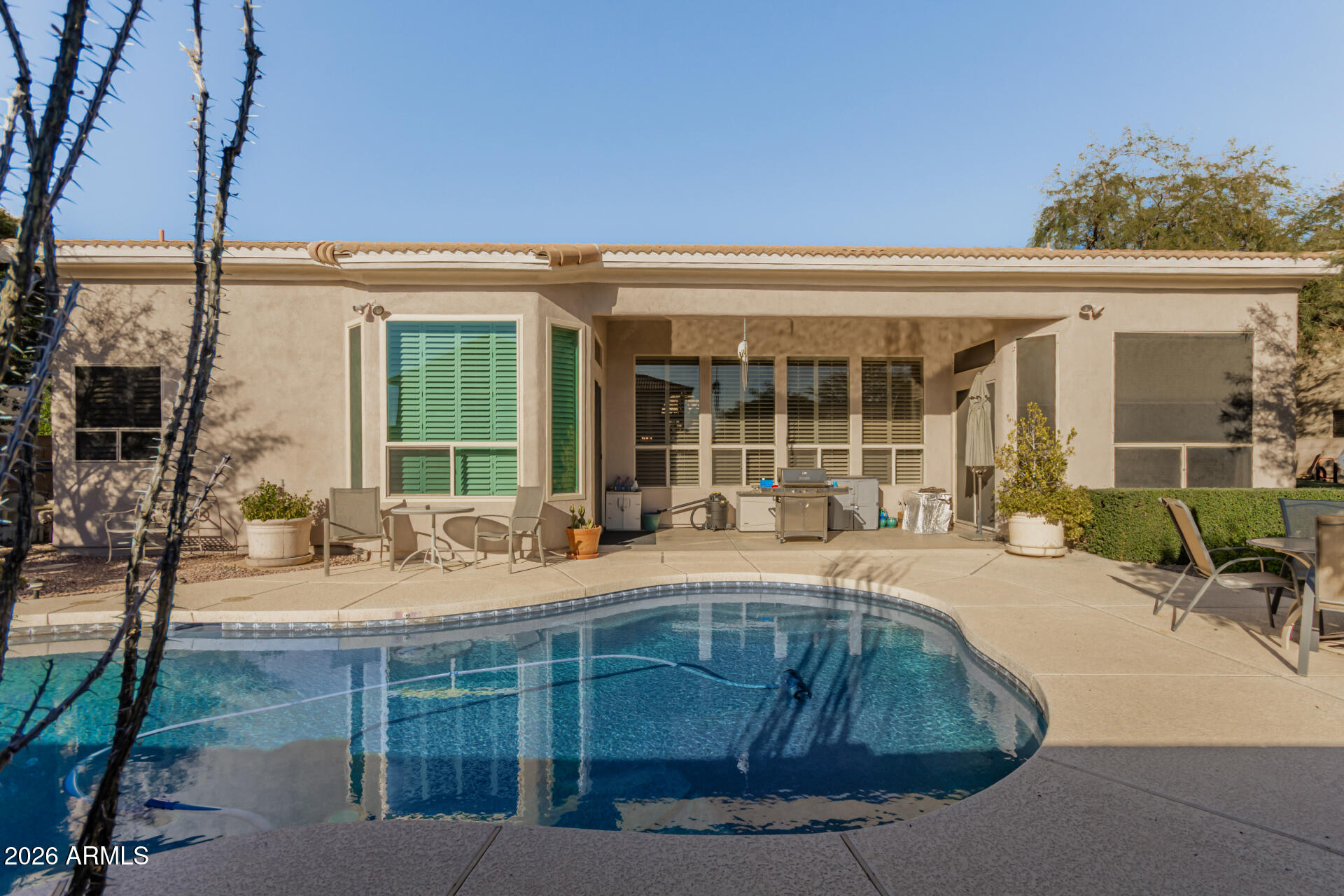 4419 East Robin Lane Phoenix, AZ 85050 - Photo 26 of 28 a house view with a sitting space