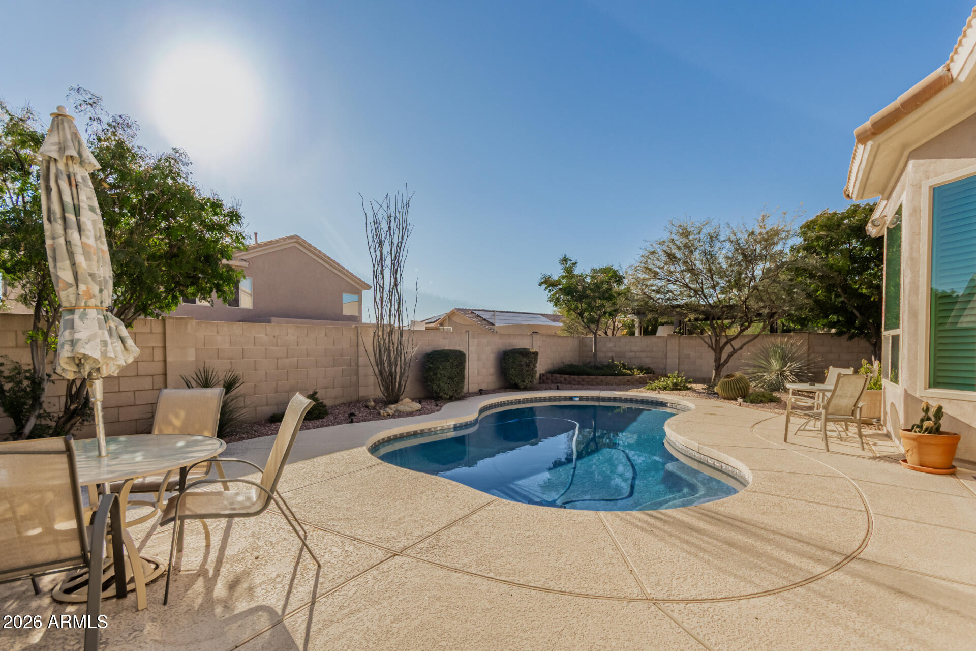4419 East Robin Lane Phoenix, AZ 85050 - Photo 28 of 28 a view of outdoor space yard deck patio and fire pit
