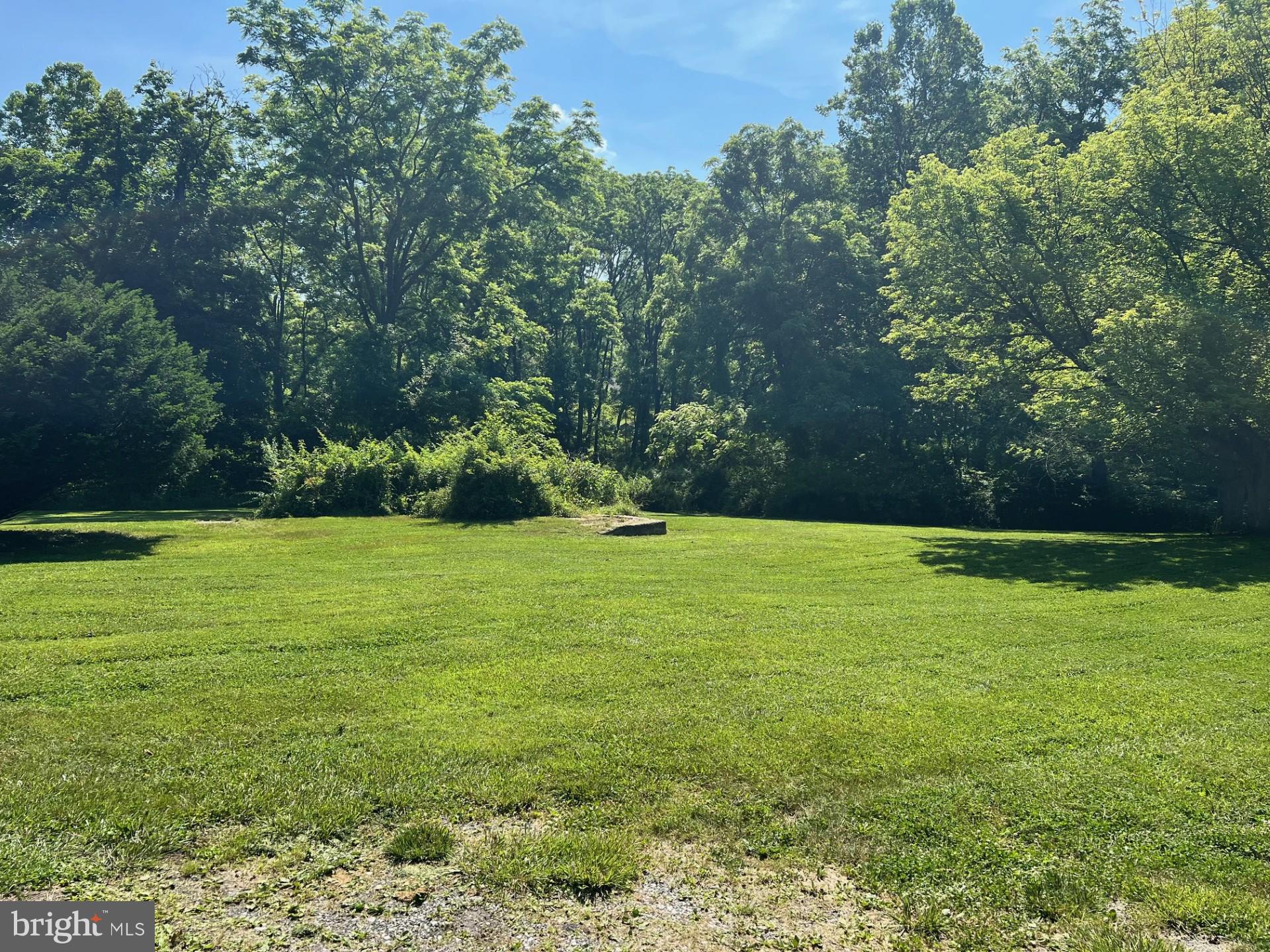 2401 Paper Mill Road Phoenix, MD 21131 - Photo 2 of 5 a view of a garden and basketball court