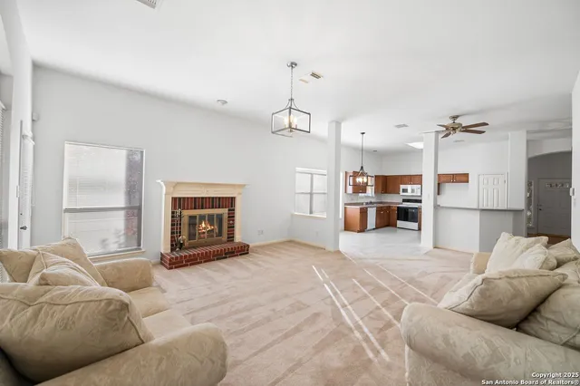 a spacious bedroom with a bed and a couch