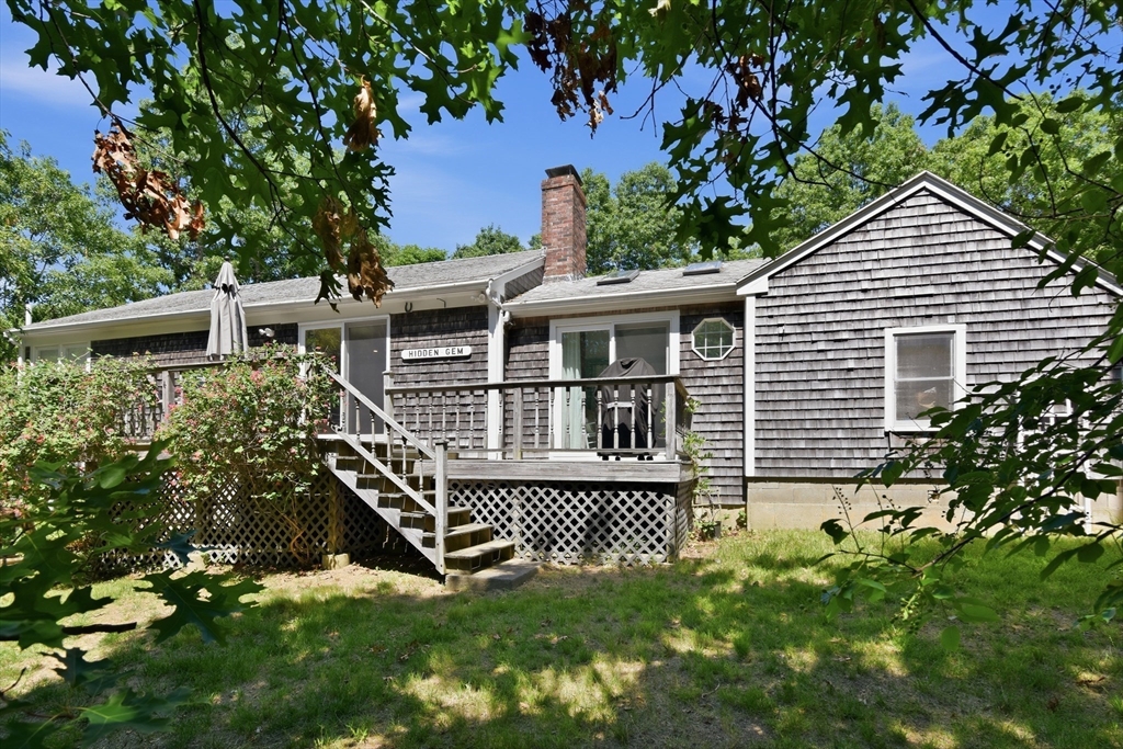 8 Emerald Way Sandwich, MA 02644 - Photo 28 of 36 front view of a house with a yard