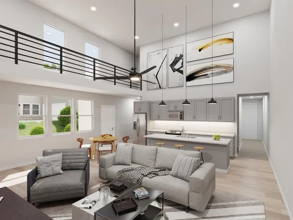 a living room with furniture kitchen view and a chandelier