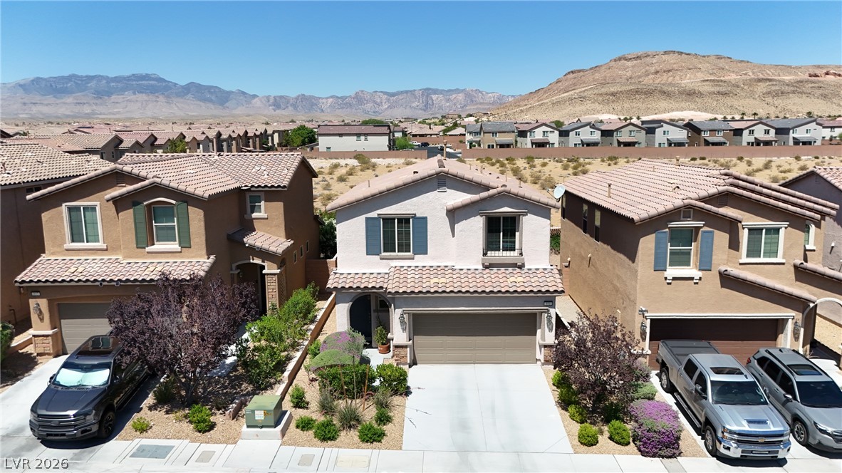 891 Earth Luster Road Las Vegas, NV 89178 - Photo 42 of 48 A desert oasis with mountain vistas provides a picturesque setting for this charming residential property.