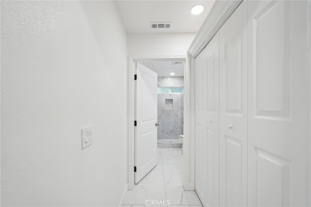 4664 Sierra Street Riverside, CA 92504 - Photo 18 of 30 a bathroom with a granite countertop sink