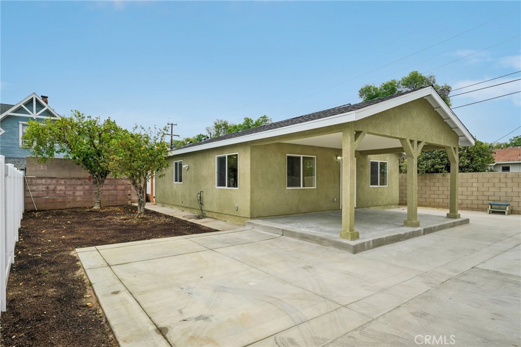 4664 Sierra Street Riverside, CA 92504 - Photo 2 of 30 a view of a house with a backyard