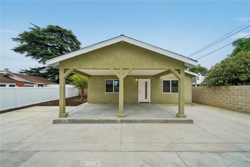 4664 Sierra Street Riverside, CA 92504 - Photo 3 of 30 a view of a house with backyard