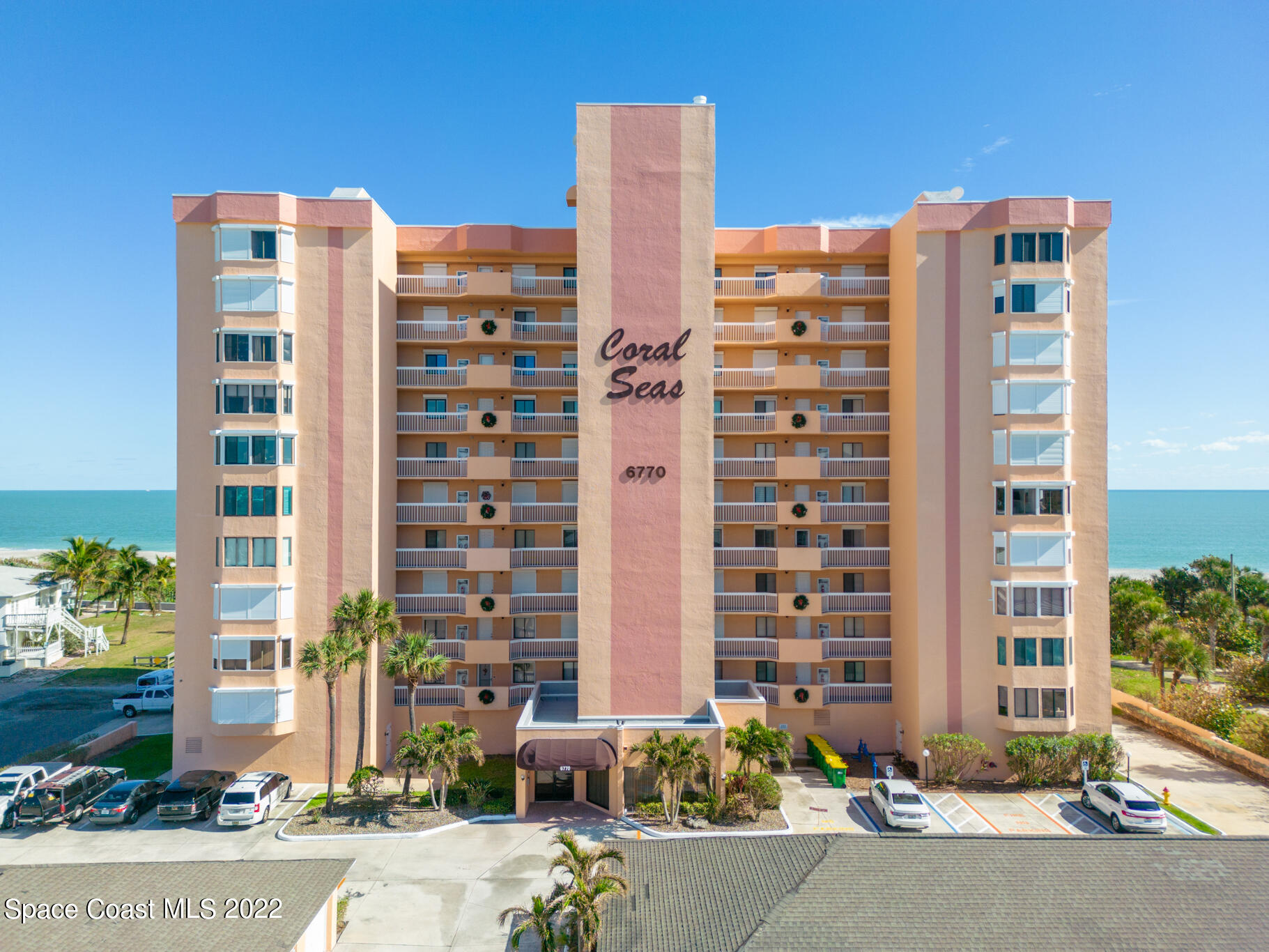 6770 Ridgewood Avenue, Unit 502 Cocoa Beach, FL 32931 - Photo 1 of 25 a front view of a building