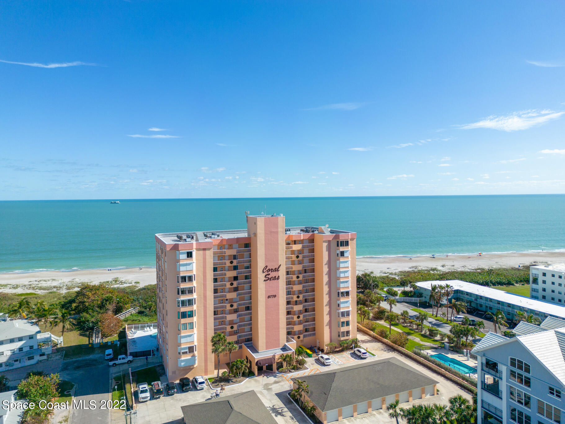 6770 Ridgewood Avenue, Unit 502 Cocoa Beach, FL 32931 - Photo 23 of 25 a view of a city with tall buildings