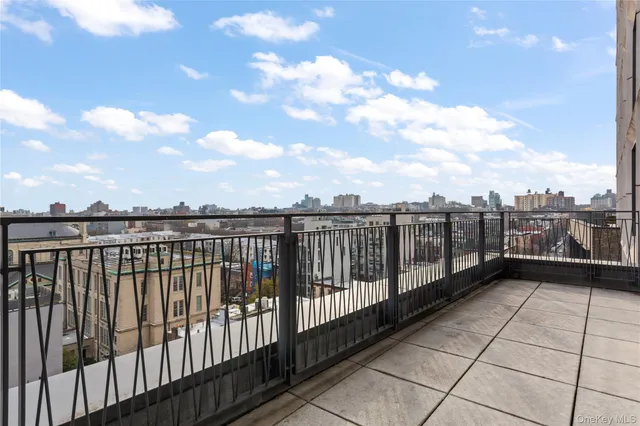 a view of city from a balcony
