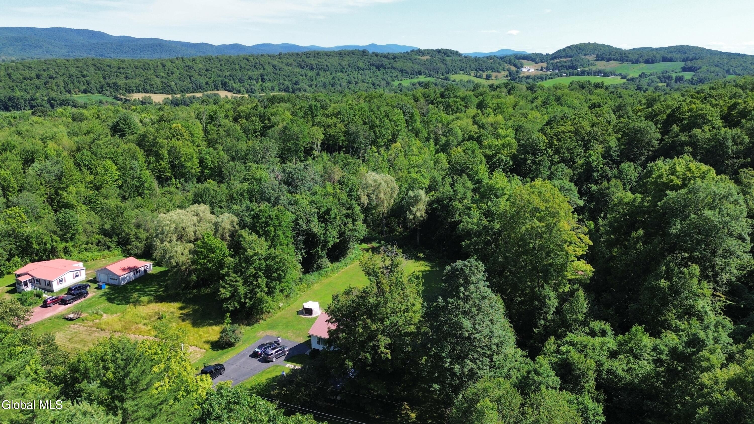 182 Beecher Road Granville, NY 12832 - Photo 5 of 25 dji_fly_20250719_153338_10_1752963097836