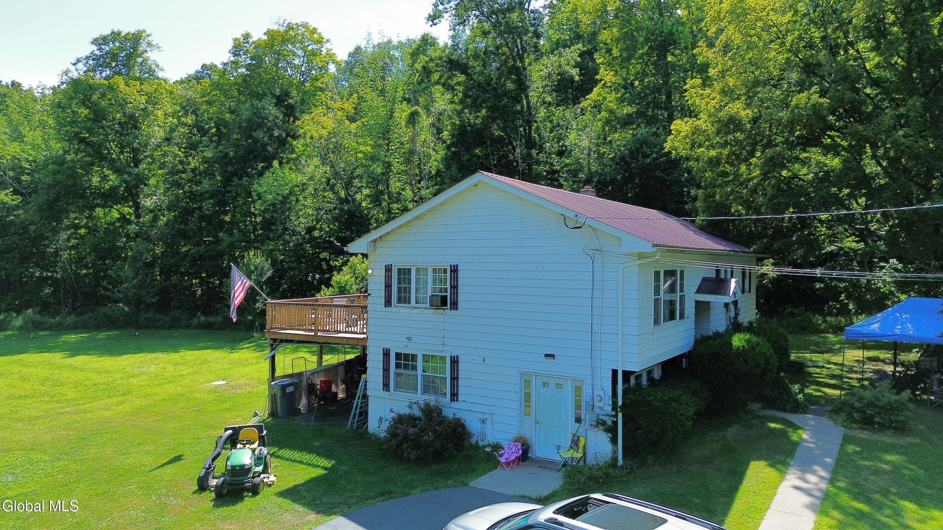 182 Beecher Road Granville, NY 12832 - Photo 8 of 25 dji_fly_20250719_152914_2_1752963129441_