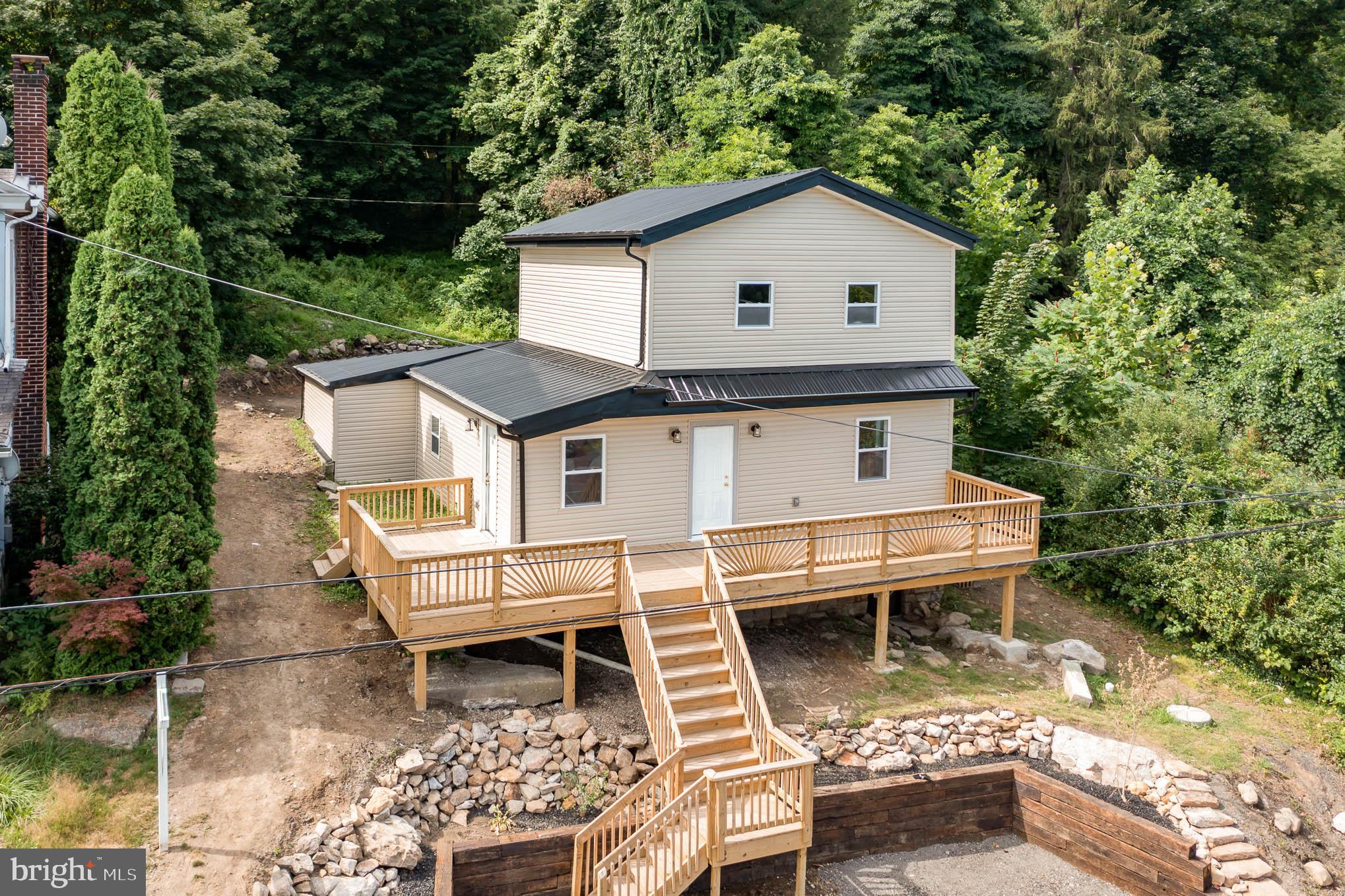 1127 State Road Duncannon, PA 17020 - Photo 3 of 27 Look at that wrap around deck!!
