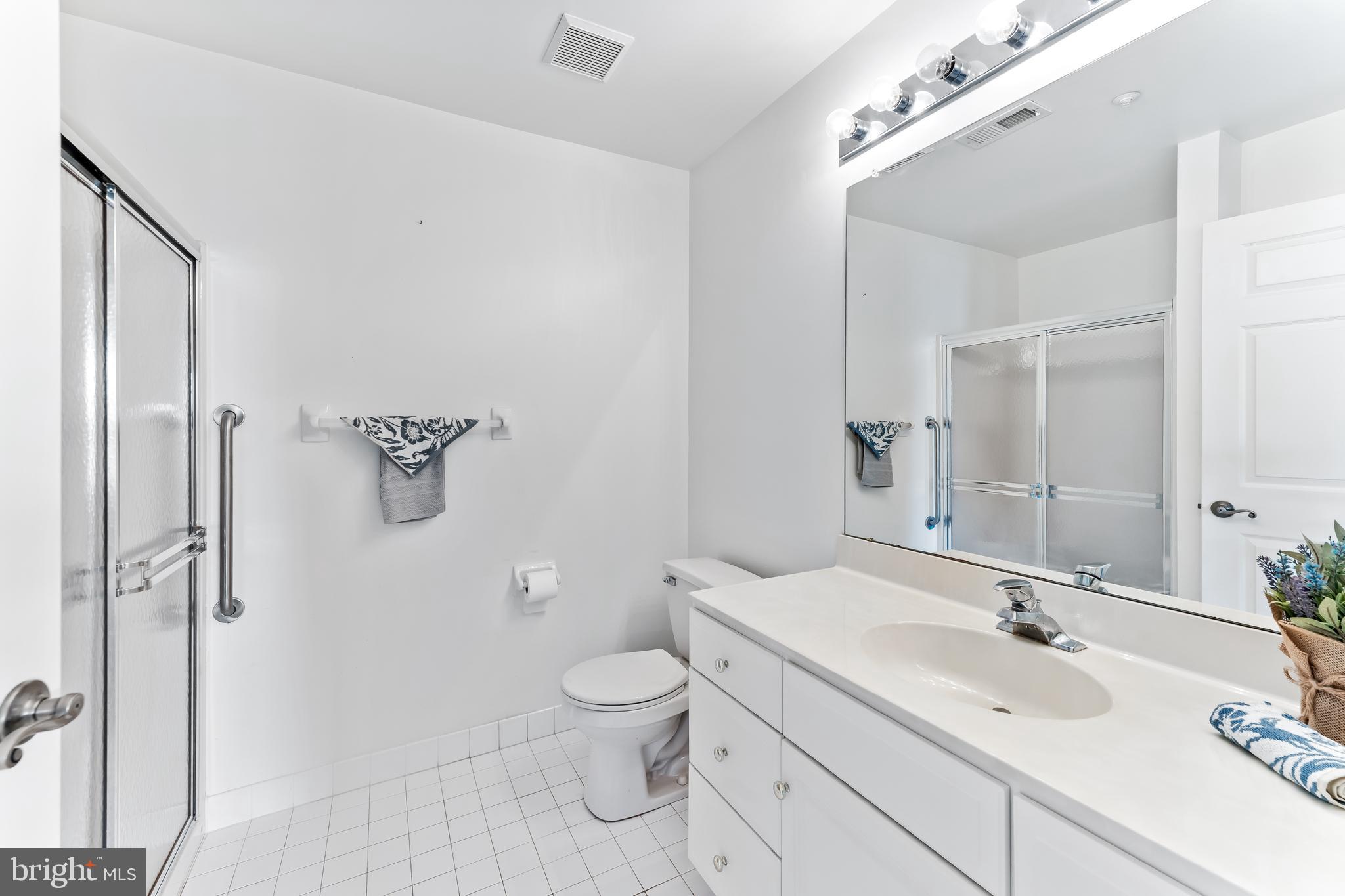 1552 Palmer Drive Springfield, PA 19064 - Photo 13 of 23 a bathroom with a sink toilet and shower