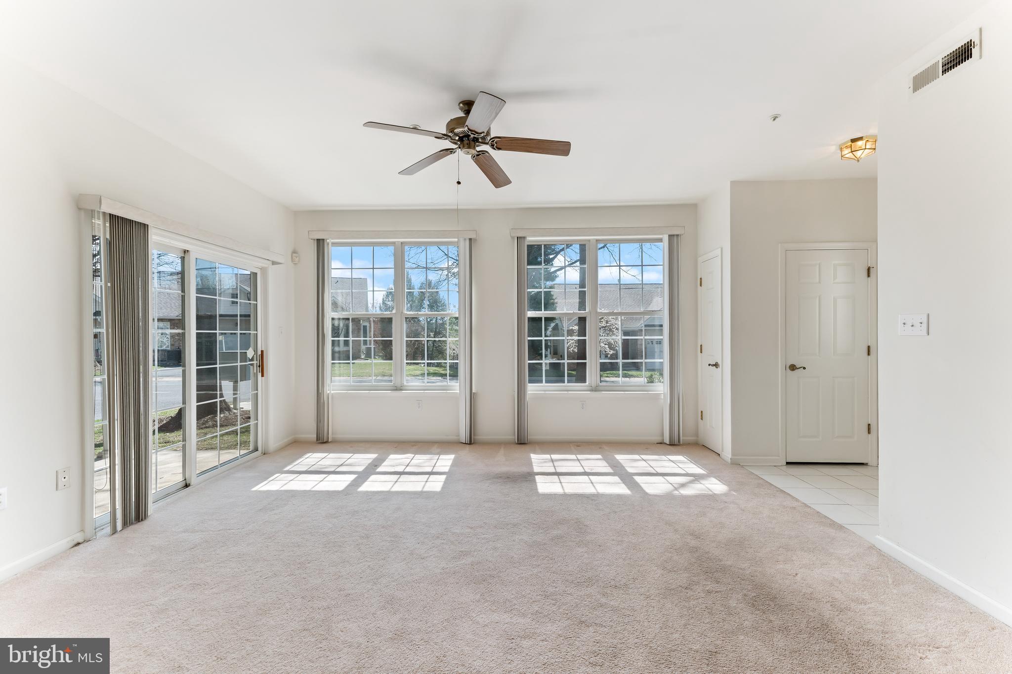 1552 Palmer Drive Springfield, PA 19064 - Photo 7 of 23 a view of an empty room with a window