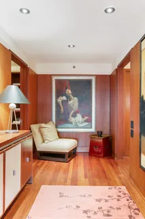 a view of an entryway with wooden floor