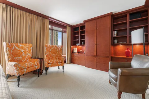 a bedroom with bed and window