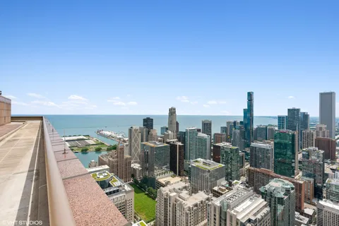 a view of a city with tall buildings in the background