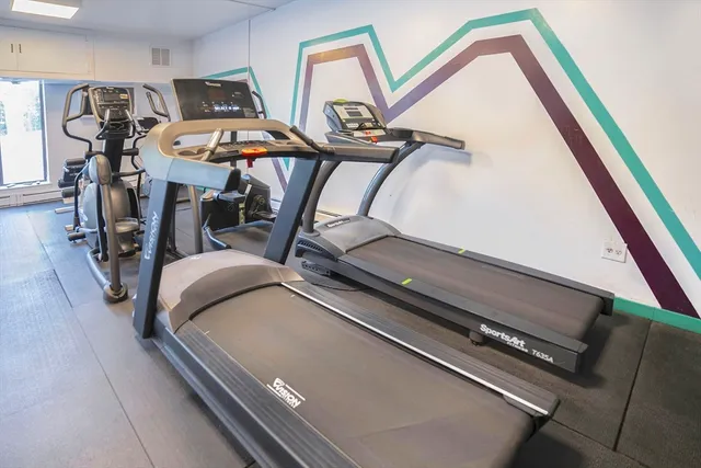 a view of a room with gym equipment