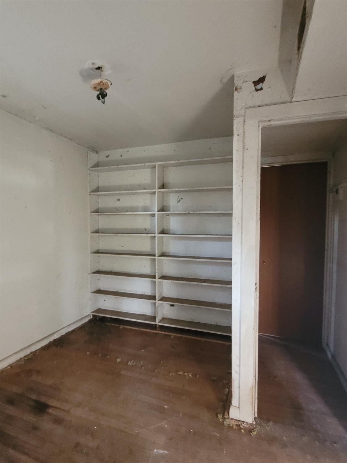 4613 Maryland Street Gary, IN 46409 - Photo 11 of 14 a view of walk in closet with empty racks