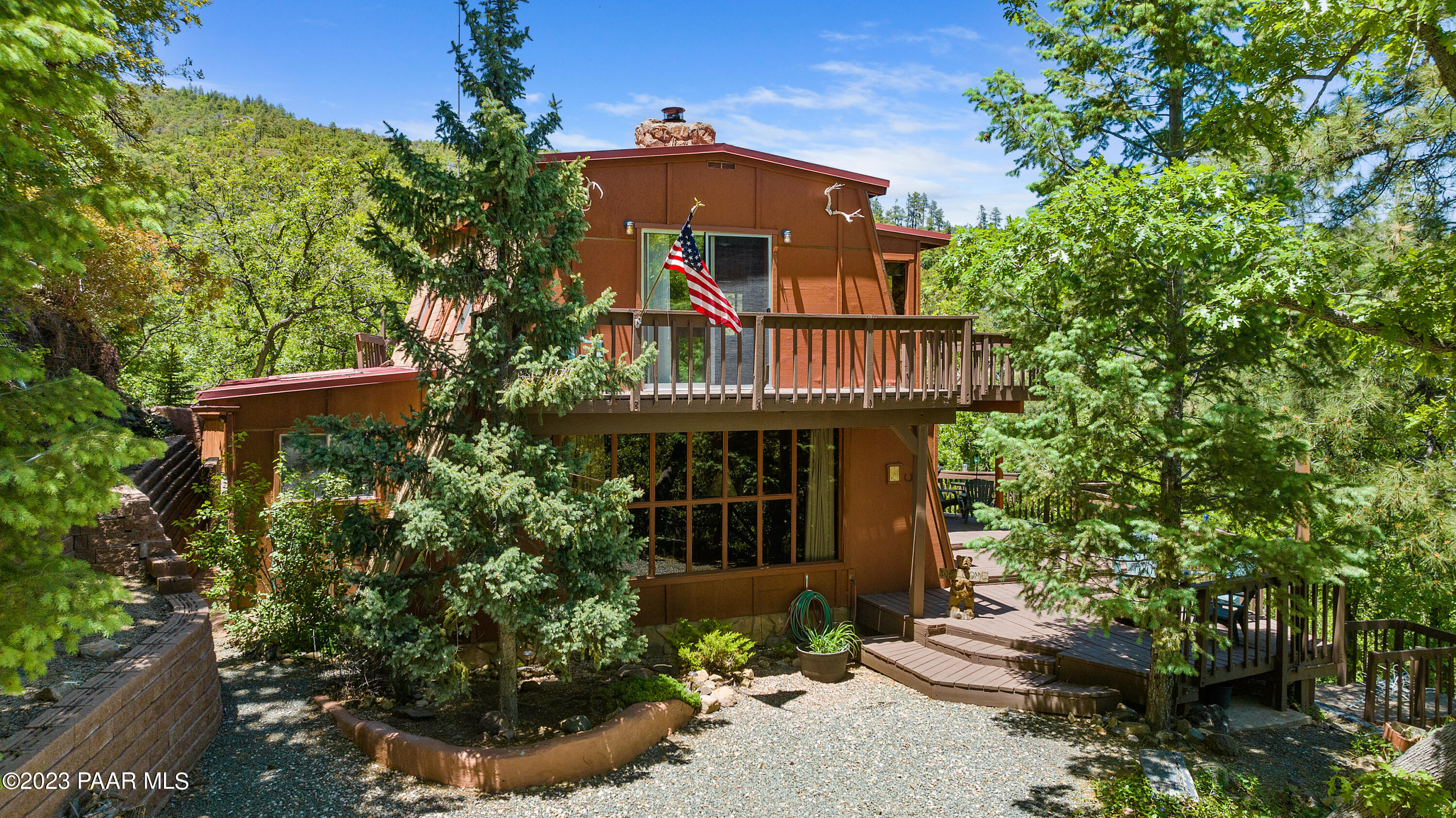 8434 Mountain View Road Mayer, AZ 86333 - Photo 1 of 33 a front view of a house with a yard