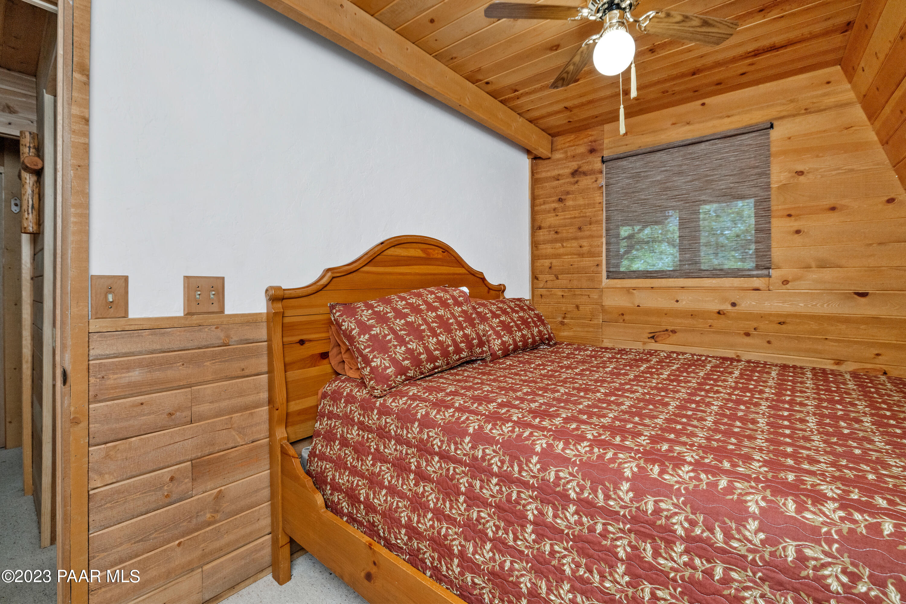 8434 Mountain View Road Mayer, AZ 86333 - Photo 20 of 33 a bedroom with a bed and a window