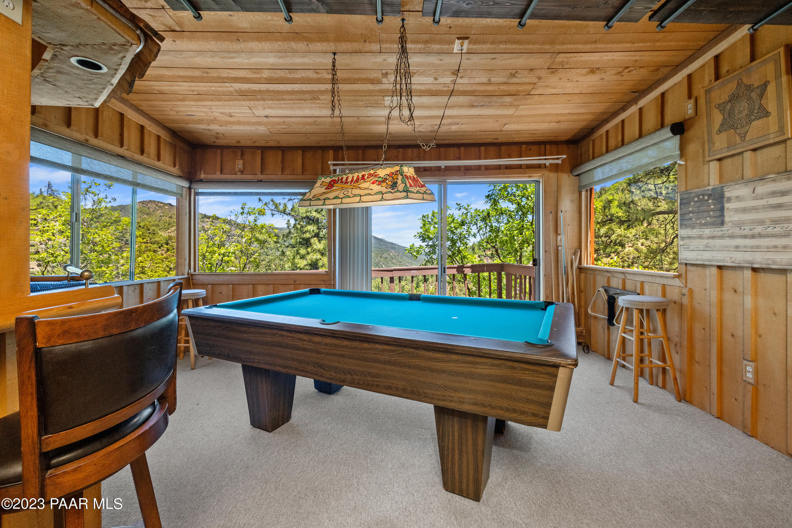 8434 Mountain View Road Mayer, AZ 86333 - Photo 23 of 33 a room with pool table and windows
