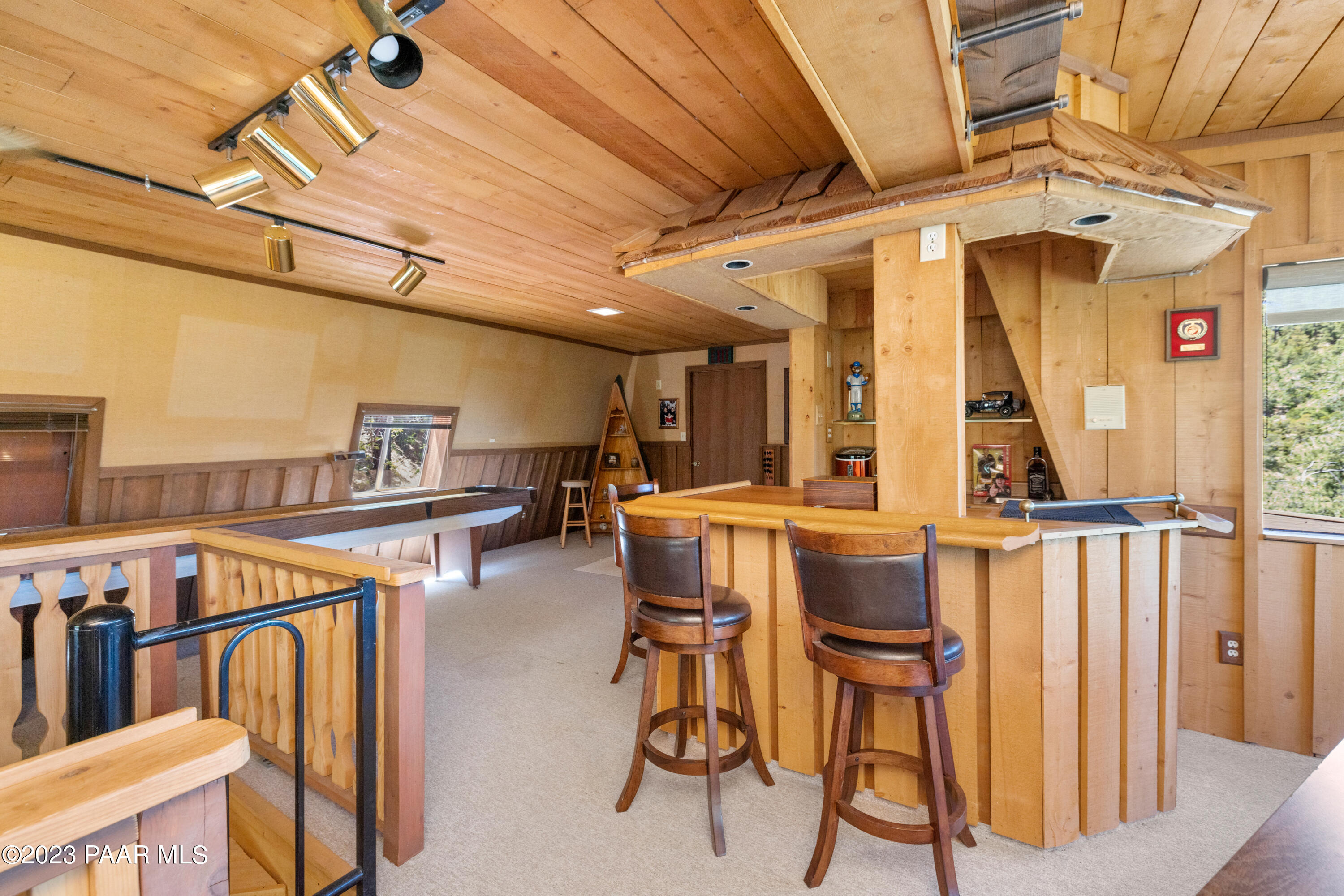 8434 Mountain View Road Mayer, AZ 86333 - Photo 25 of 33 a view of a patio with dining table and chairs