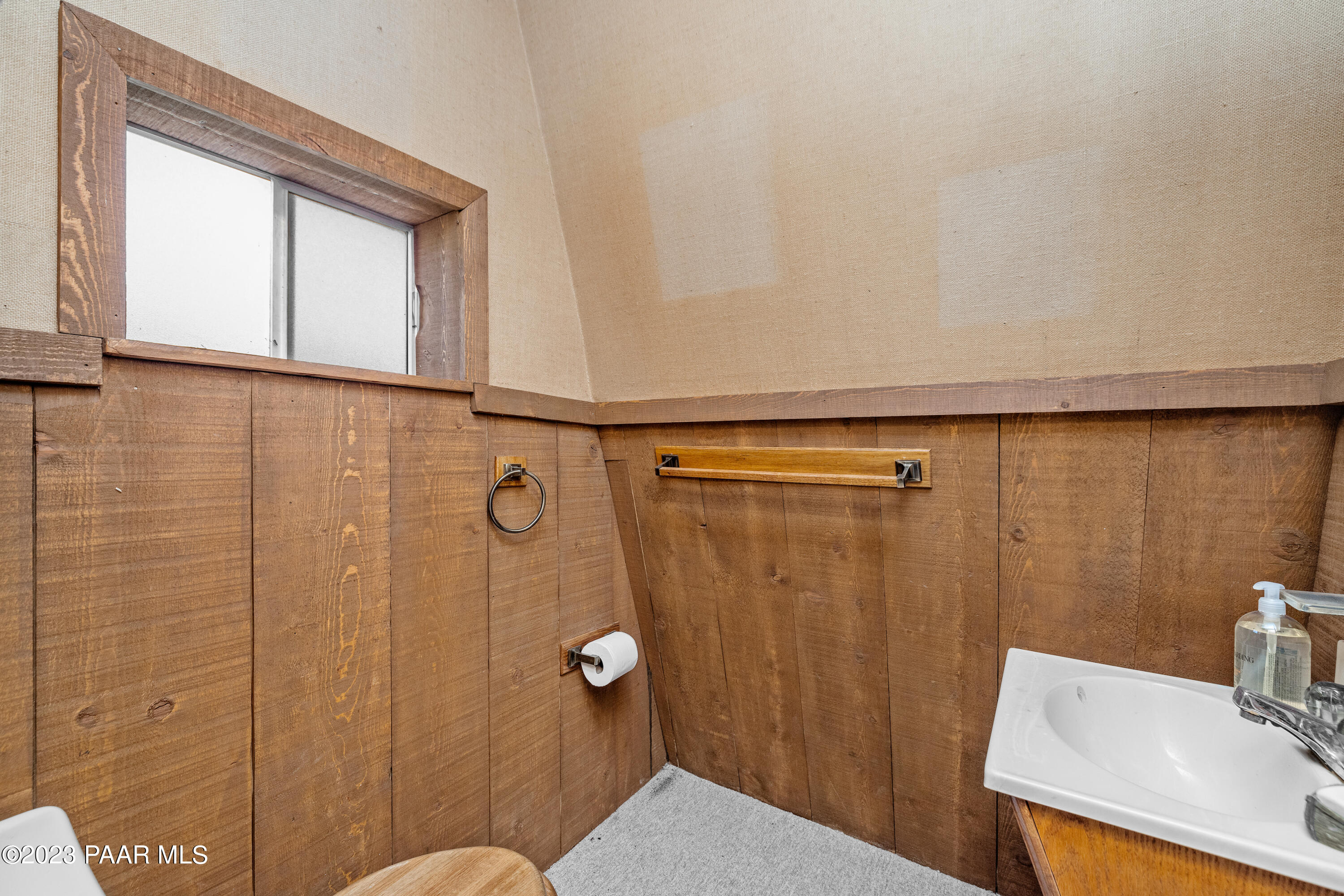 8434 Mountain View Road Mayer, AZ 86333 - Photo 27 of 33 a bathroom with a shower curtain and a sink