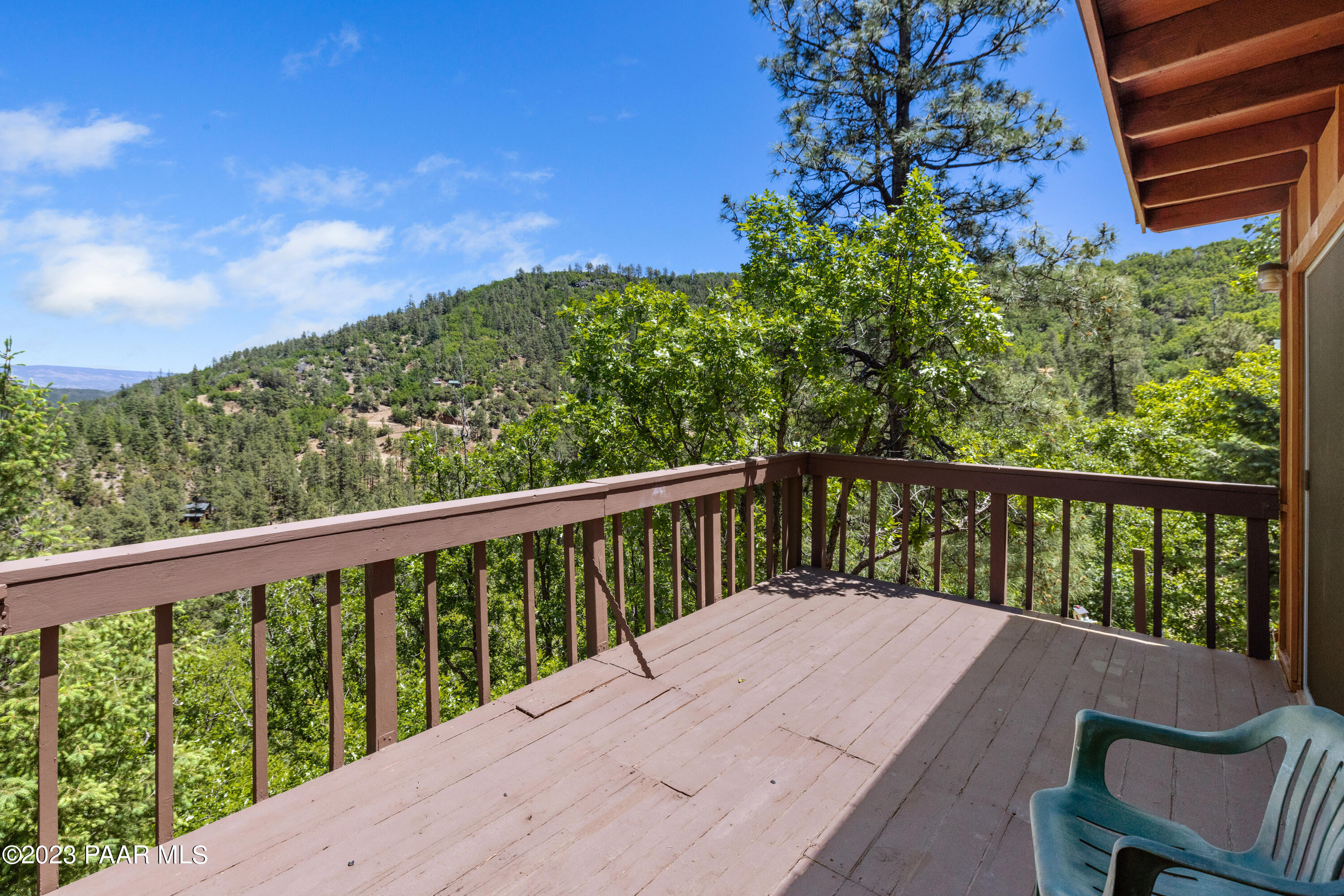 8434 Mountain View Road Mayer, AZ 86333 - Photo 30 of 33 a balcony with wooden floor and fence