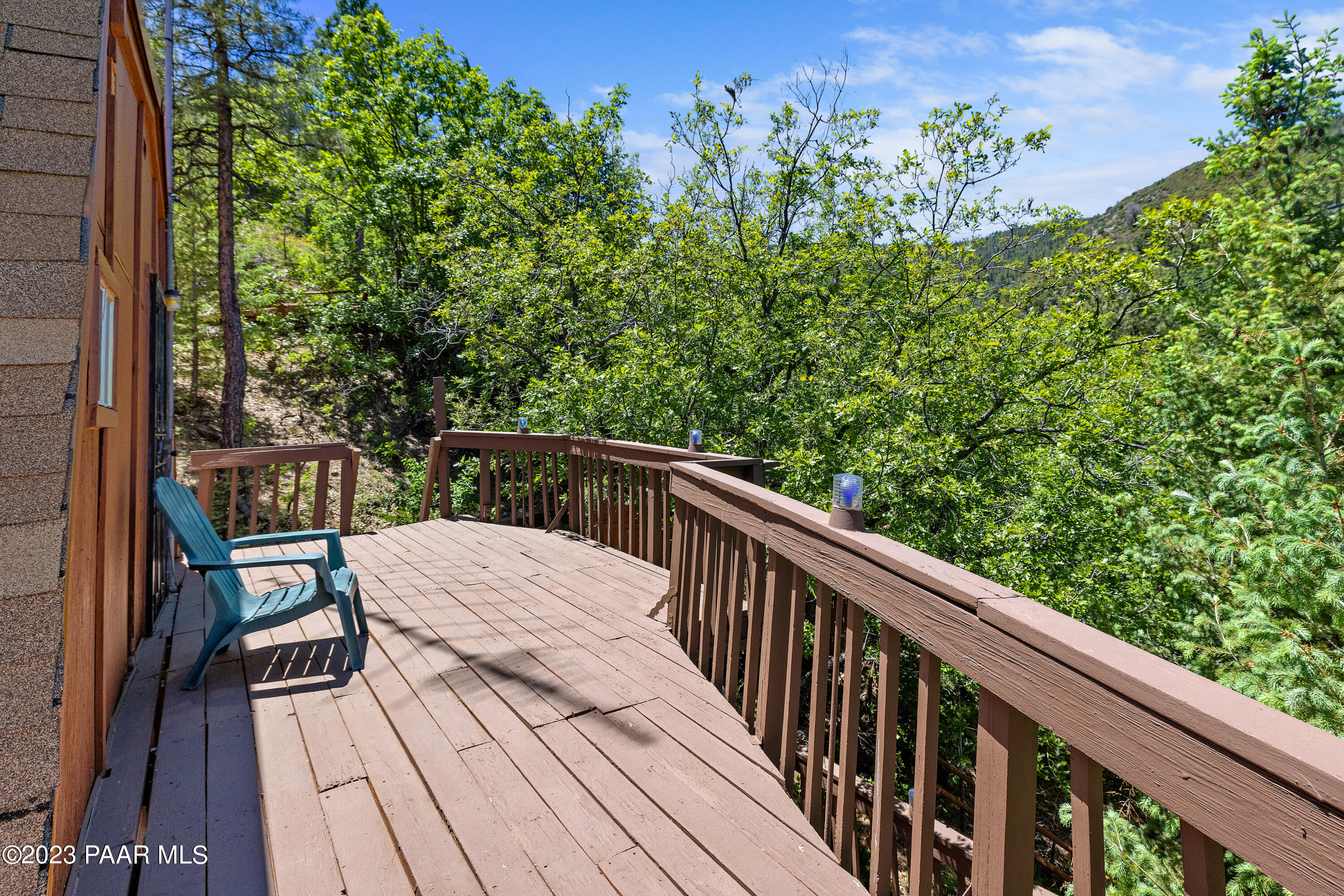 8434 Mountain View Road Mayer, AZ 86333 - Photo 31 of 33 a view of balcony with wooden floor and outdoor seating