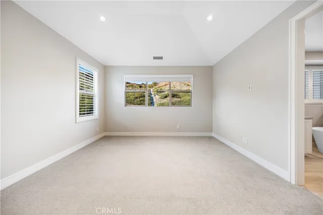 an empty room with windows