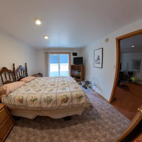 a room with furniture and wooden floor