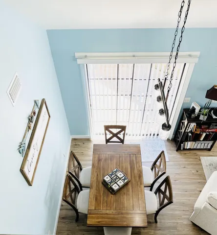 a view of living room with furniture and a window