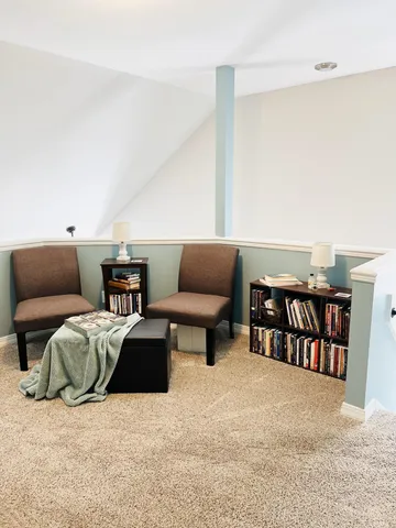 a living room with furniture and a couch