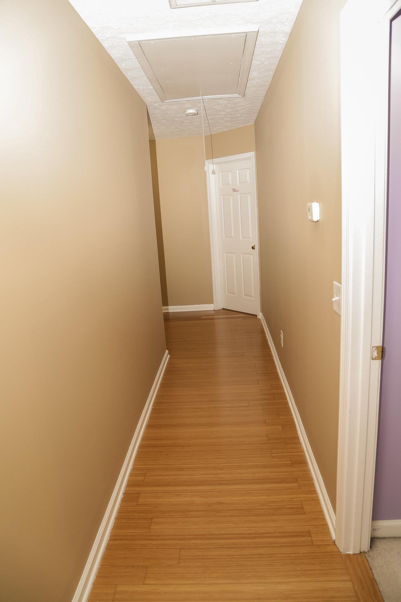 5301 Ridgefalls Way Antioch, TN 37013 - Photo 16 of 30 a view of a hallway with wooden floor