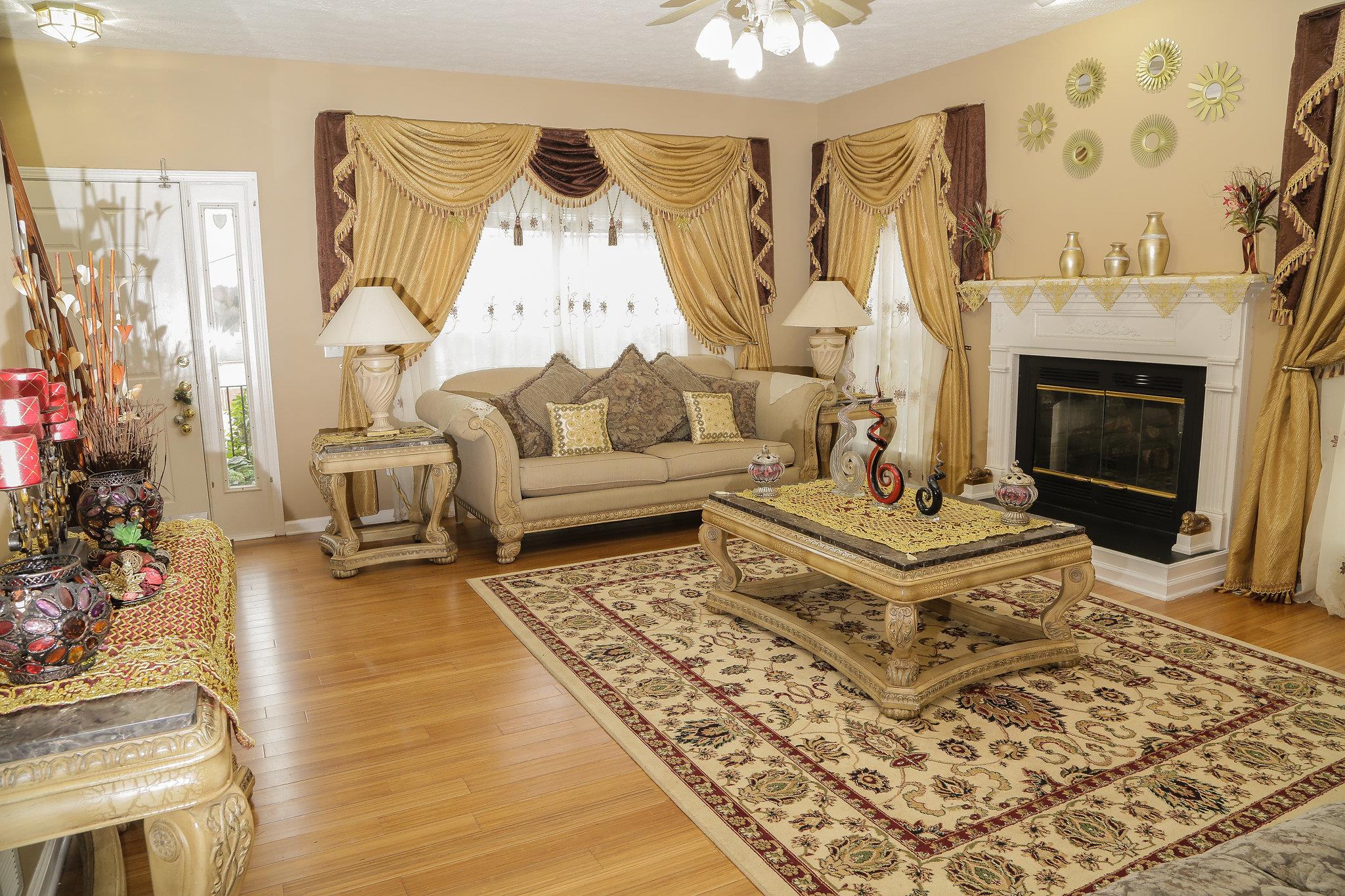 5301 Ridgefalls Way Antioch, TN 37013 - Photo 4 of 30 a living room with furniture and a fireplace
