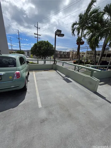 a view of a street with cars