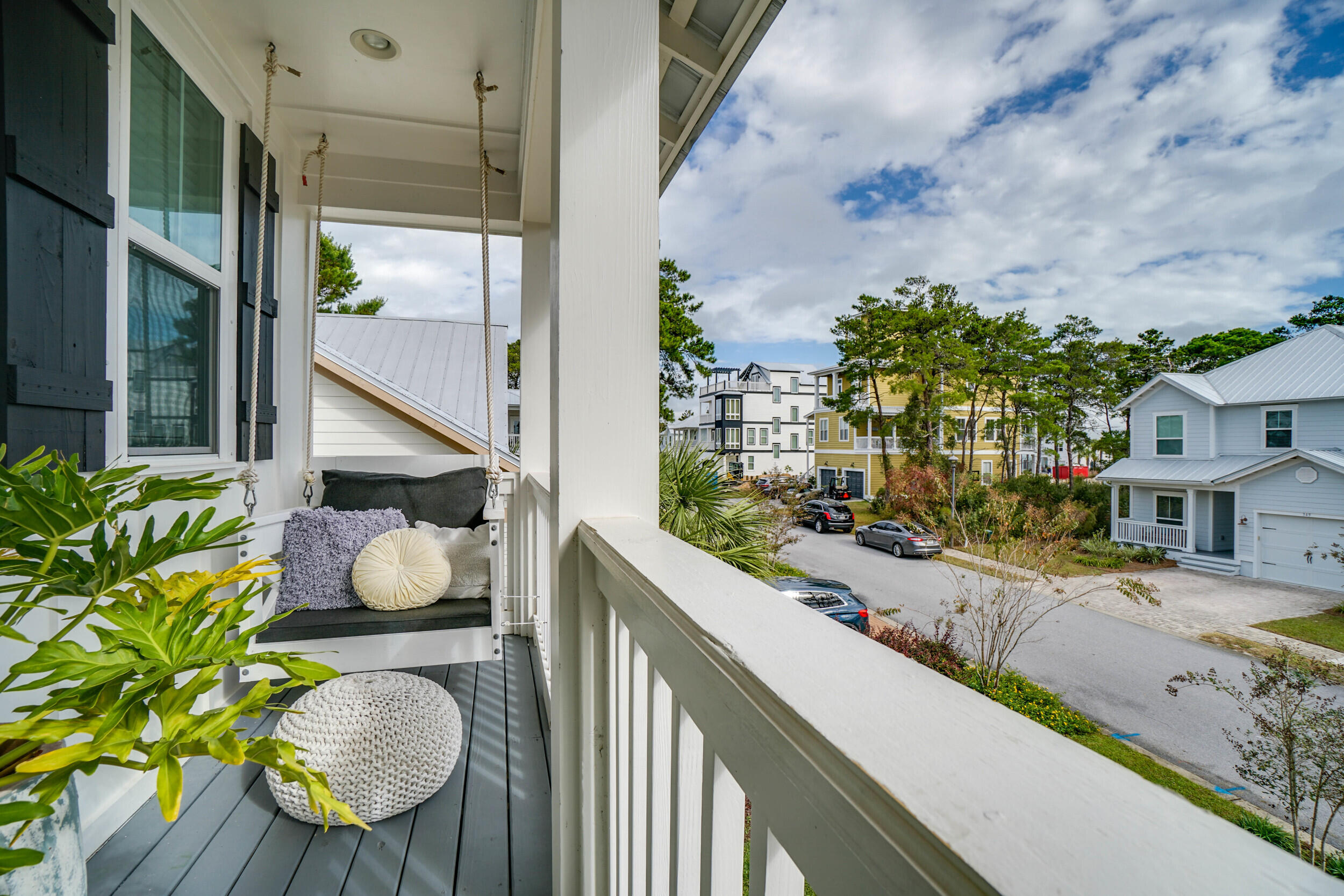 364 Grande Pointe Circle Inlet Beach, FL 32461 - Photo 16 of 26 a view of a balcony with chair and wooden floor