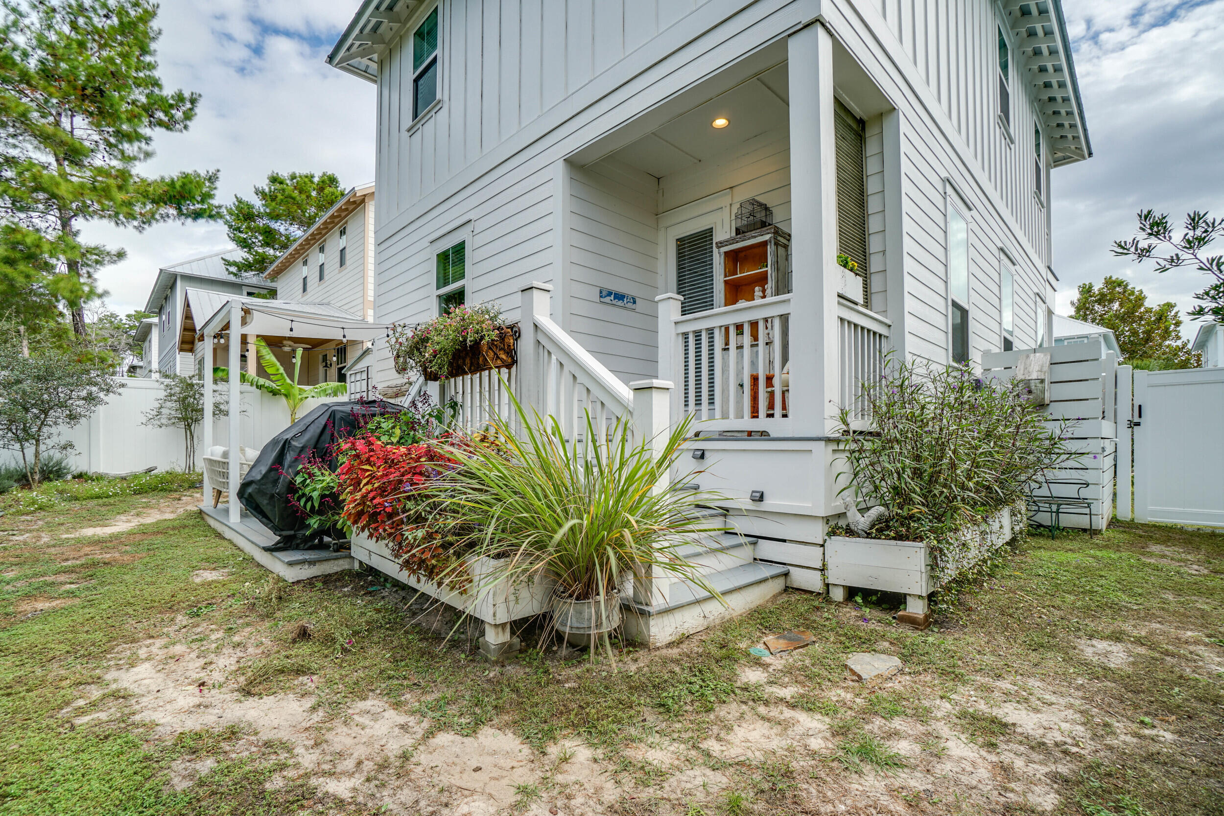 364 Grande Pointe Circle Inlet Beach, FL 32461 - Photo 21 of 26 a front view of a house with a yard