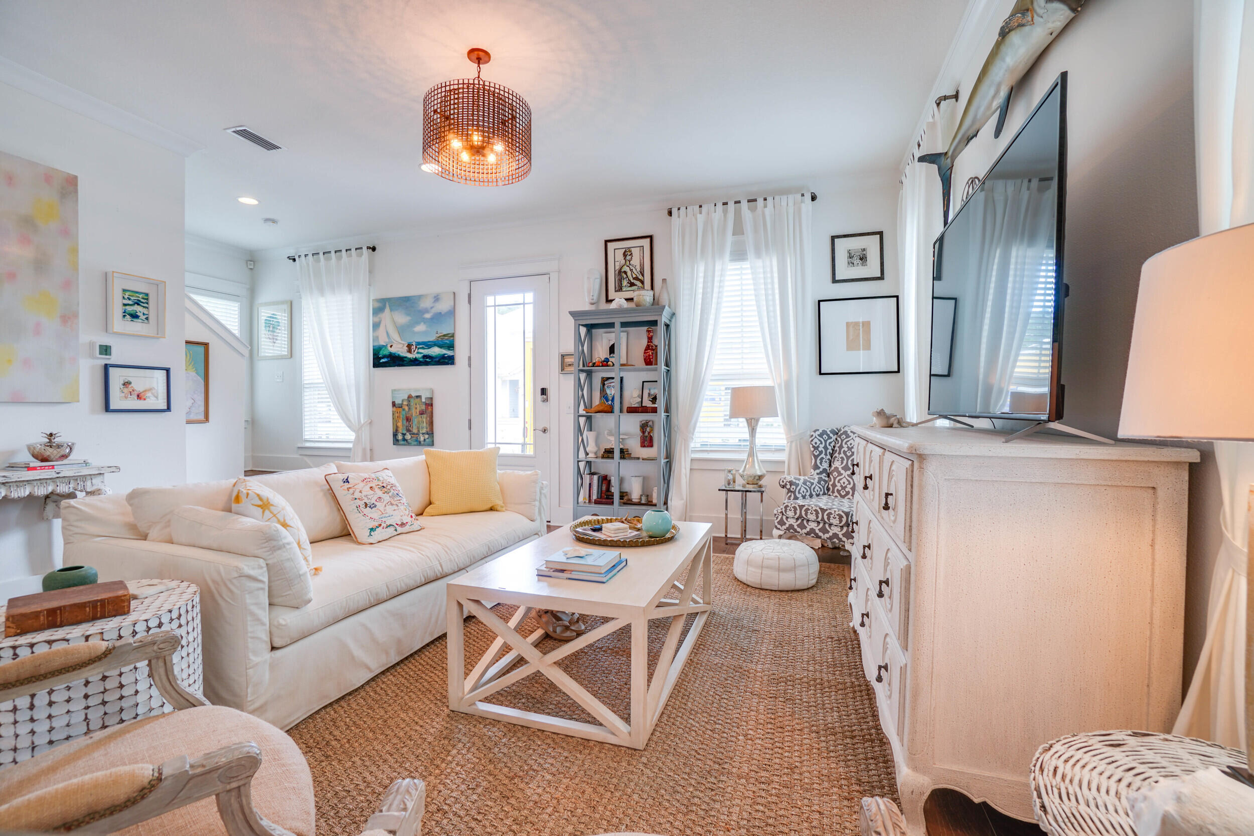 364 Grande Pointe Circle Inlet Beach, FL 32461 - Photo 5 of 26 a living room with furniture and floor to ceiling window