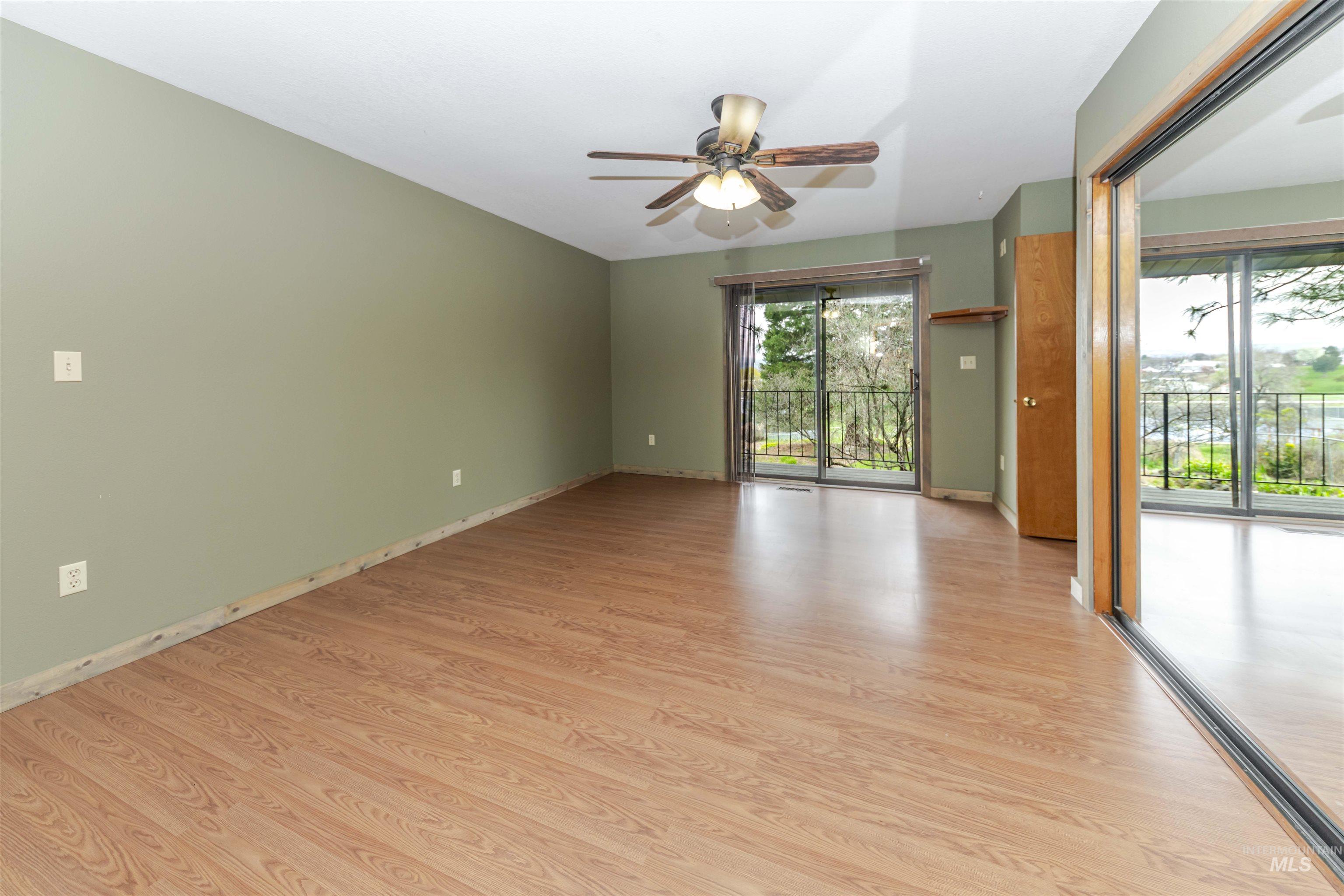 1316 29th Street Lewiston, ID 83501 - Photo 16 of 31 Primary Bedroom with light wood-style floors and ceiling fan