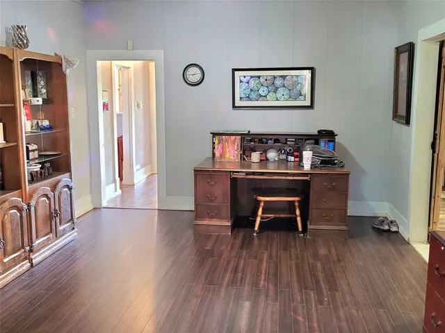 a workspace with furniture and window