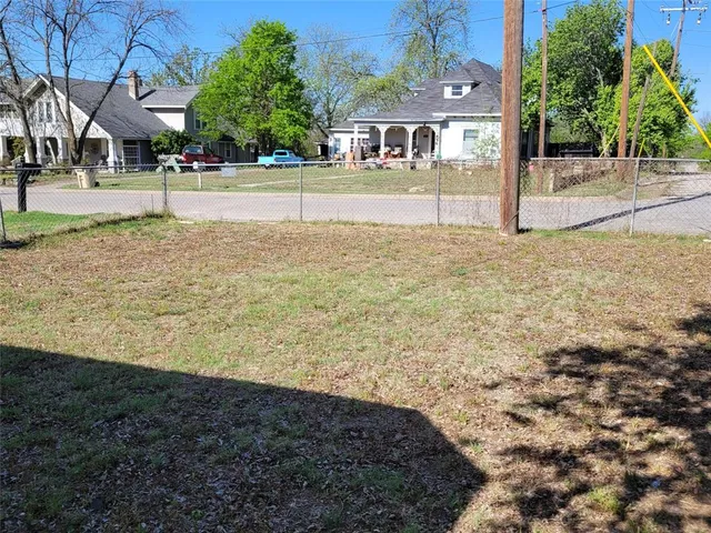a front view of house with yard