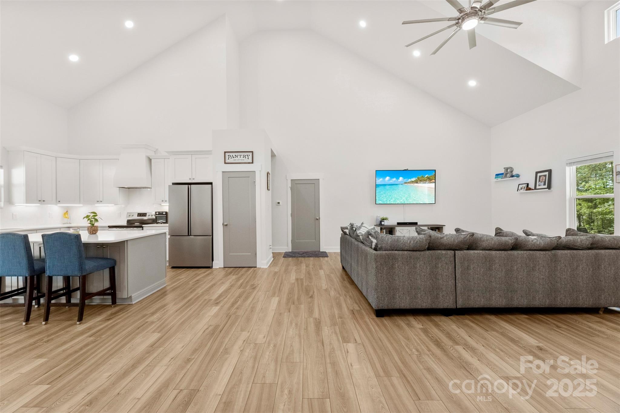 7683 Sarah Drive Denver, NC 28037 - Photo 14 of 25 a living room with furniture and kitchen view