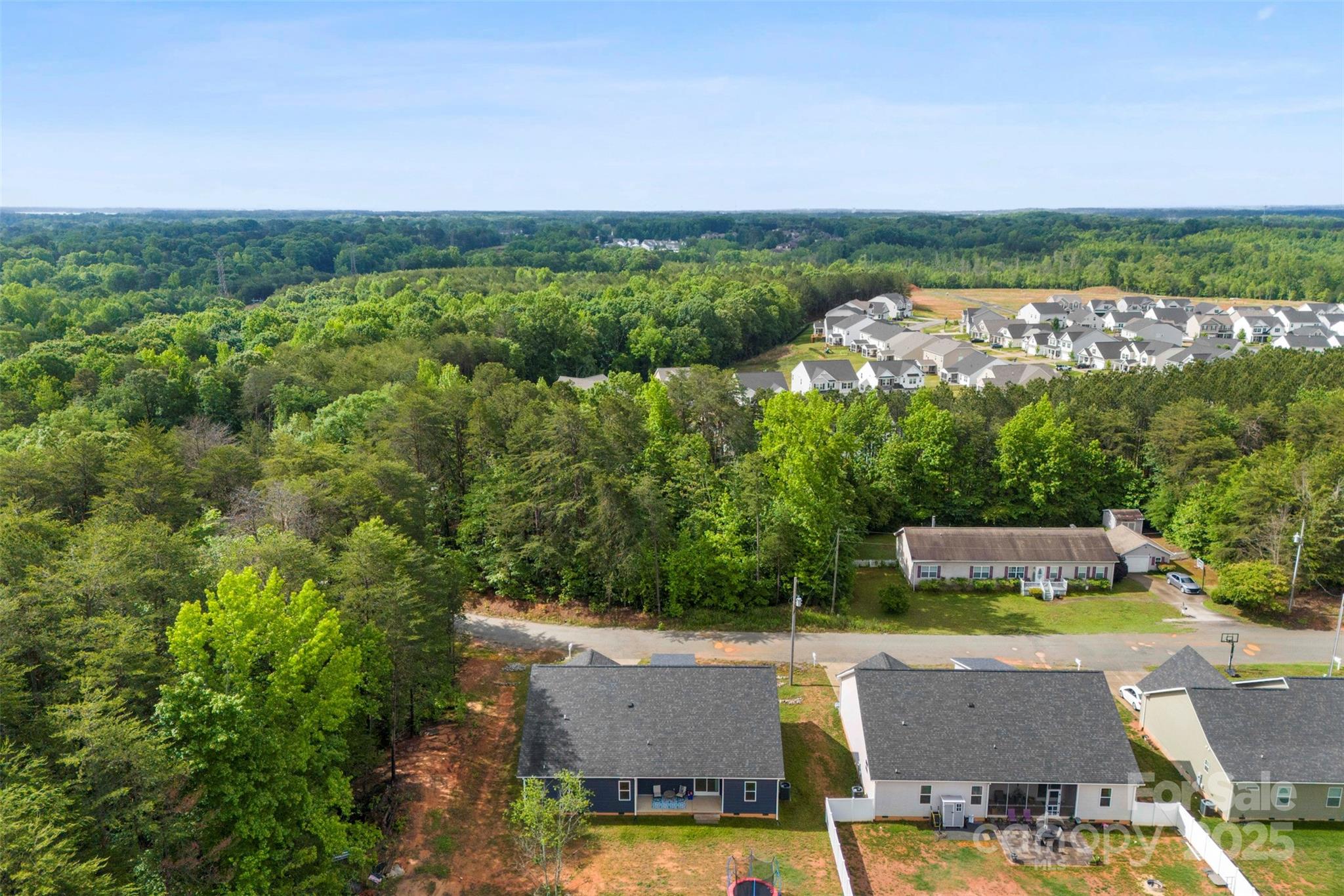 7683 Sarah Drive Denver, NC 28037 - Photo 25 of 25 an aerial view of a house with pool outdoor seating and yard