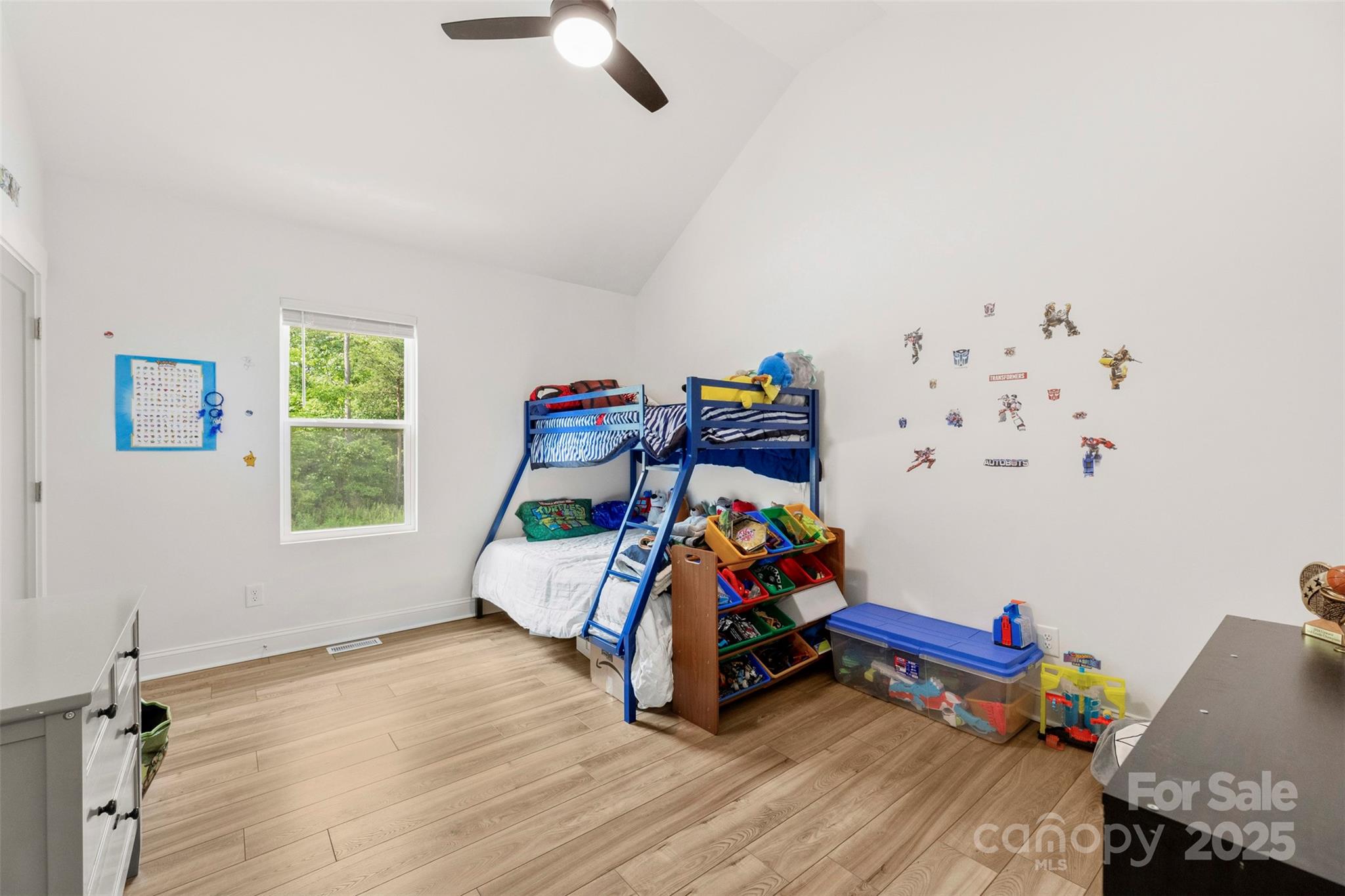 7683 Sarah Drive Denver, NC 28037 - Photo 4 of 25 a bedroom with bed and a window