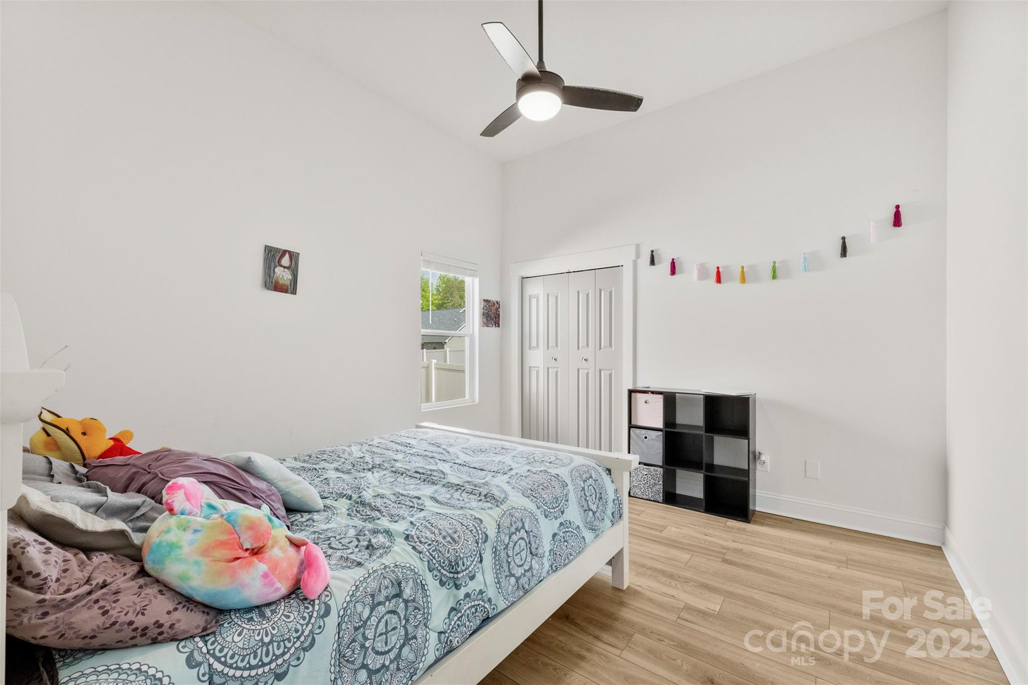 7683 Sarah Drive Denver, NC 28037 - Photo 7 of 25 a bedroom with furniture and a bed