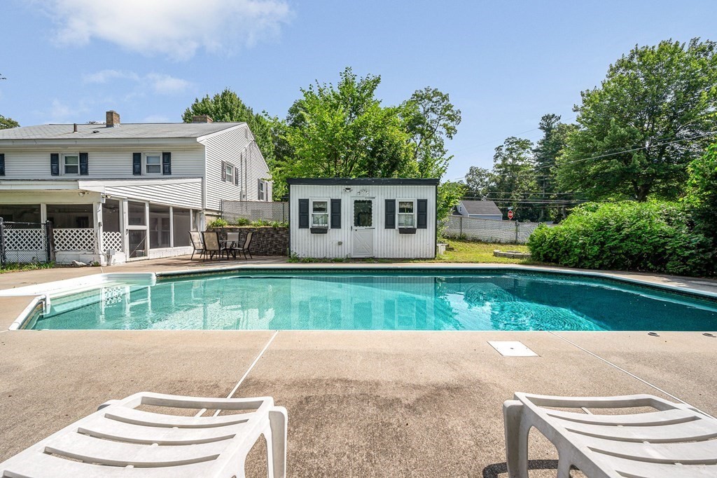 174 Frost Road Tyngsborough, MA 01879 - Photo 14 of 17 front view of house with a yard
