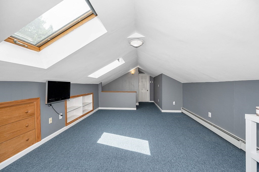 174 Frost Road Tyngsborough, MA 01879 - Photo 8 of 17 a view of an empty room and window