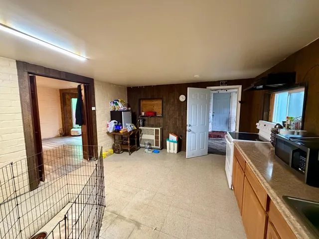 a view of a livingroom with furniture and a livingroom